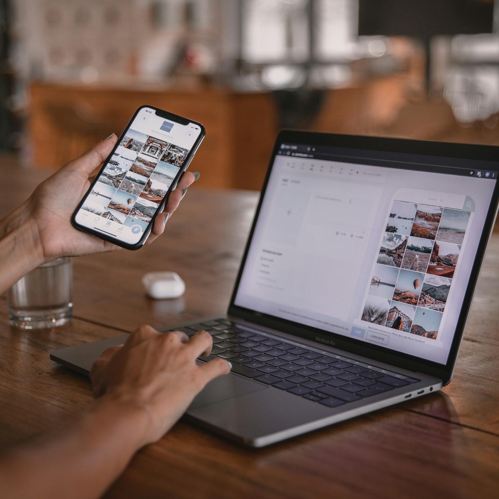 Am I A Serious Food Blogger? Woman edits social media content on phone and laptop at a cafe in Bali.