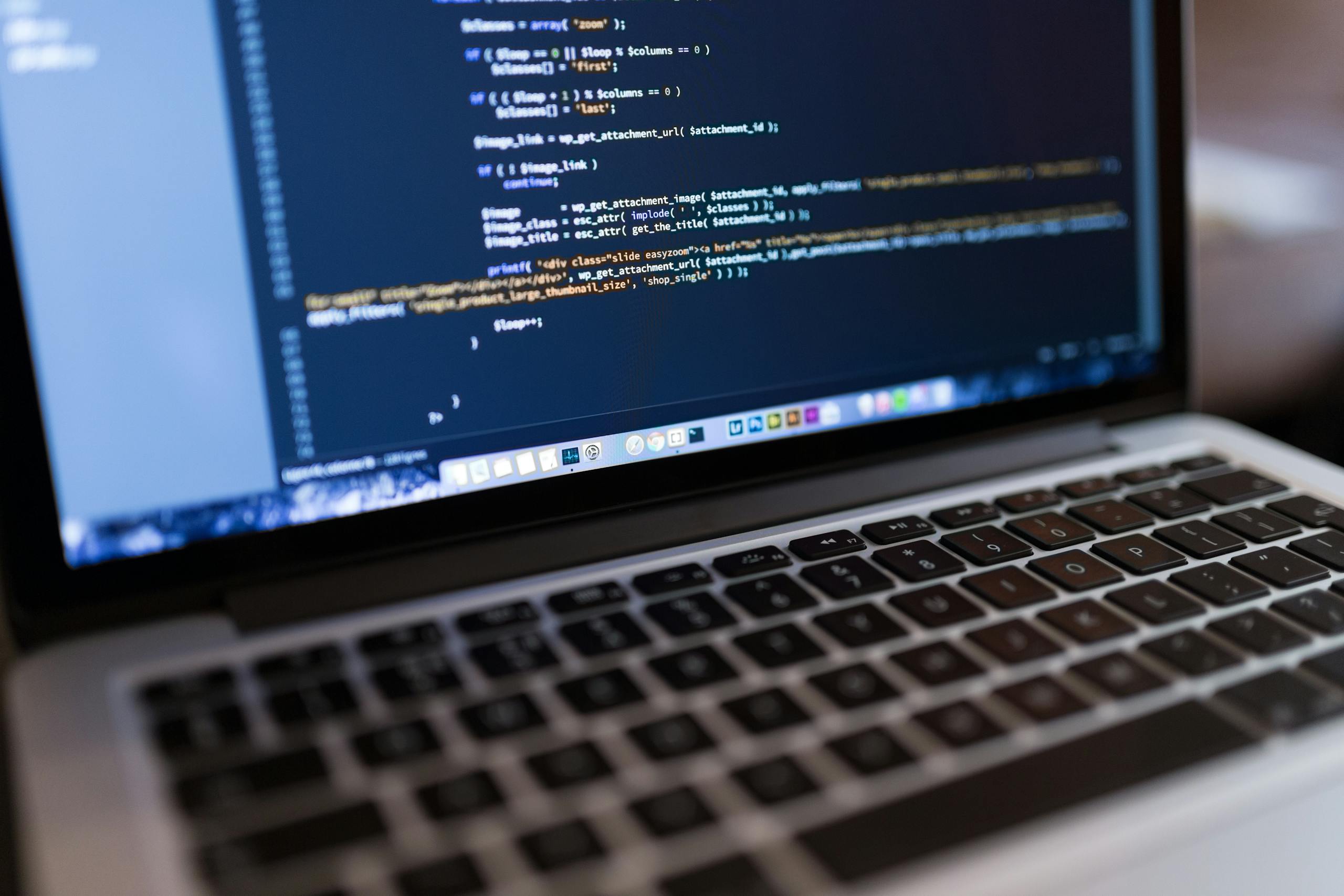 add Gutenberg Editor to WooCommerce Using Code Focused view of programming code displayed on a laptop, ideal for tech and coding themes and why we need to add gutenberg editor to woocommerce.